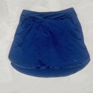 Navy blue Nike tennis skirt with pockets. Size small. Dri fit.
